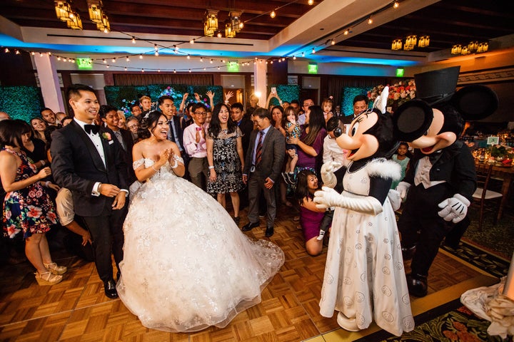 Mickey and Minnie are the best wedding crashers.