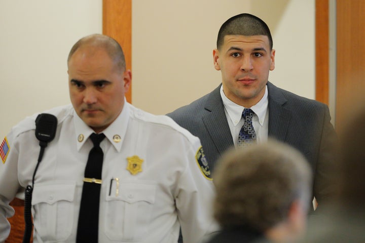 Former New England Patriots football player Aaron Hernandez arrives in the courtroom at Bristol County Superior Court in Fall River, Massachusetts, on April 1, 2015.