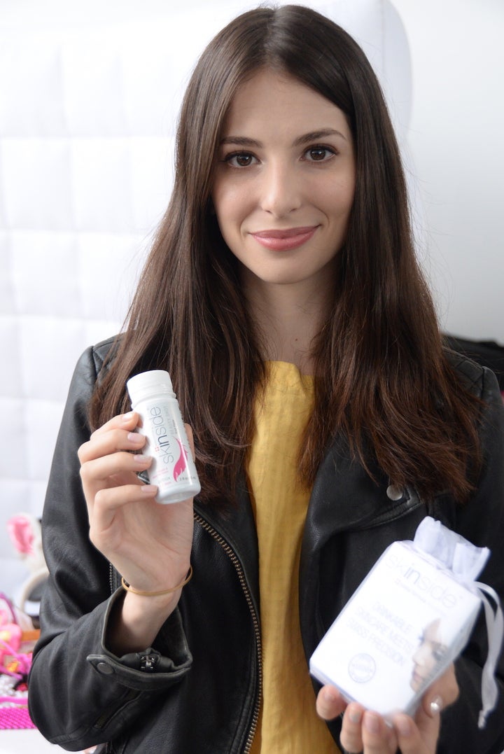 <p>Genevieve Buechner with Skinside Drinkable Collagen</p>