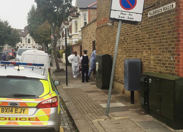 Forensic officers and police at the scene in Wandsworth