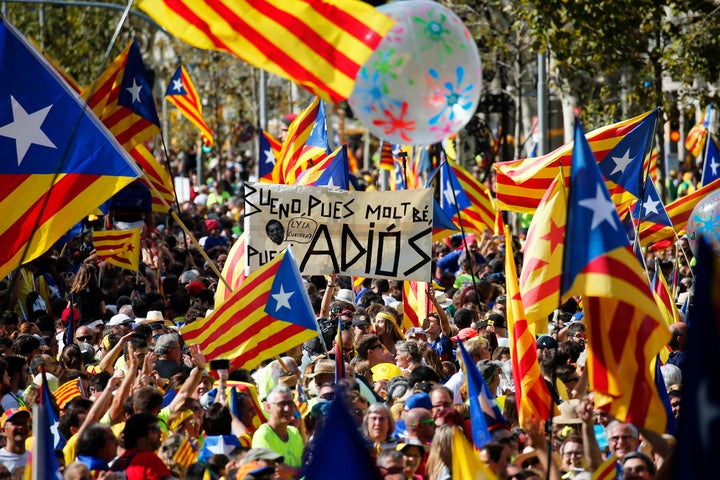 Demonstrators celebrate the National Day of Catalonia