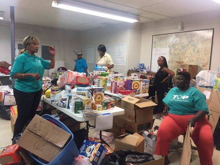 Texas Organizing Project organizers distributing critical resources collected through the Harvey Community Relief Fund.  