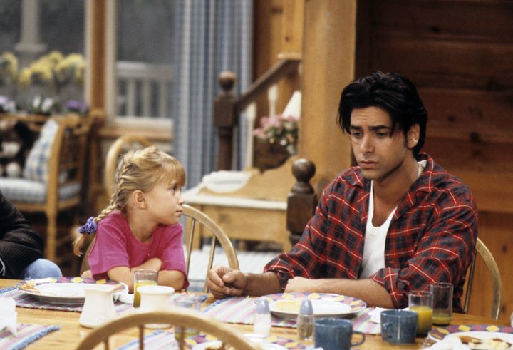 Mary Kate Olsen and John Stamos in the original series. 