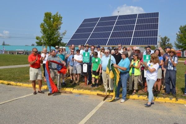 Ribbon cutting ceremony for the new solar powered EV charging stations at Oxford Hills High School. Photo taken during the EV Expo on September 16. 