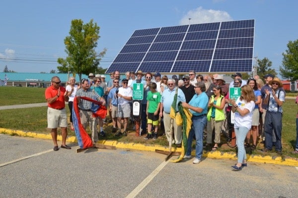 <em>Ribbon cutting ceremony for the new solar powered EV charging stations at Oxford Hills High School. Photo taken during th