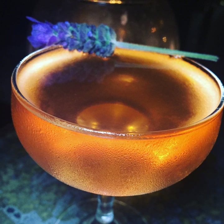 The Reservoir with Botanist Gin, El Silencio mezcal, dry vermouth, Velvet Falernum, strawberry lavender