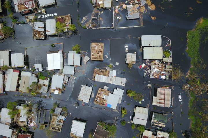 Flooding saturates the neighborhood of Juana Matos in Catano, Puerto Rico, in the aftermath of Hurricane Maria on Friday.