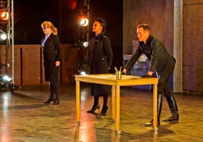 Provost (Patty Gallagher), Escalus (Tristan Cunningham), and Angelo (David Graham Jones) in a scene from <em><strong>Measure