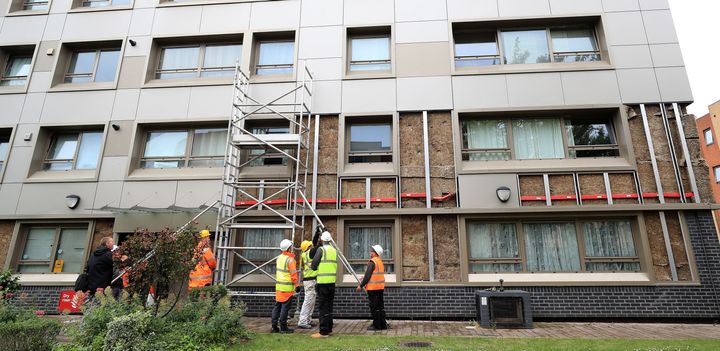 Cladding has been removed from high-rise residential buildings across the UK