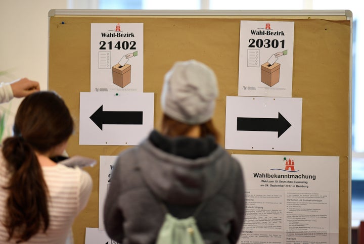 Voters enter a polling station during general election (Bundestagswahl) in Hamburg, Germany, September 24, 2017.