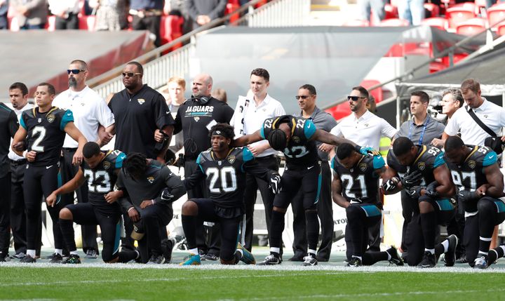 Jacksonville Jaguars players kneel during the US national anthem before the match at Wembley Stadium, London, on Sunday