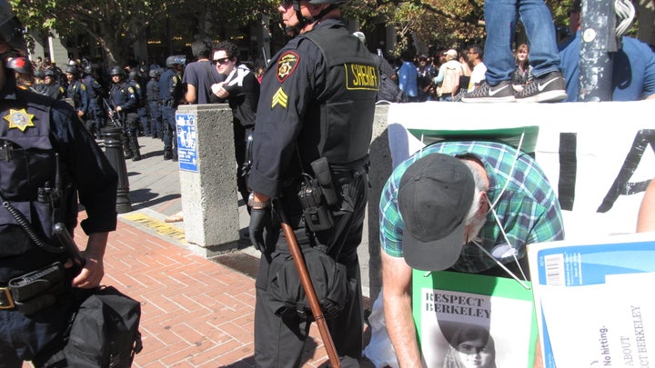 The massive police presence at the southern edge of Sproul Plaza. 