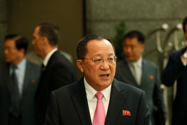 North Korean Foreign Minister Ri Yong Ho walks to speak to the media outside the Millennium hotel in New York.