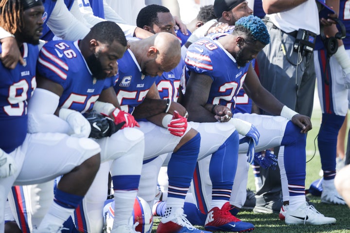Buffalo Bills players knelt during the national anthem before their game against the Denver Broncos on Sunday, Sept. 24. 