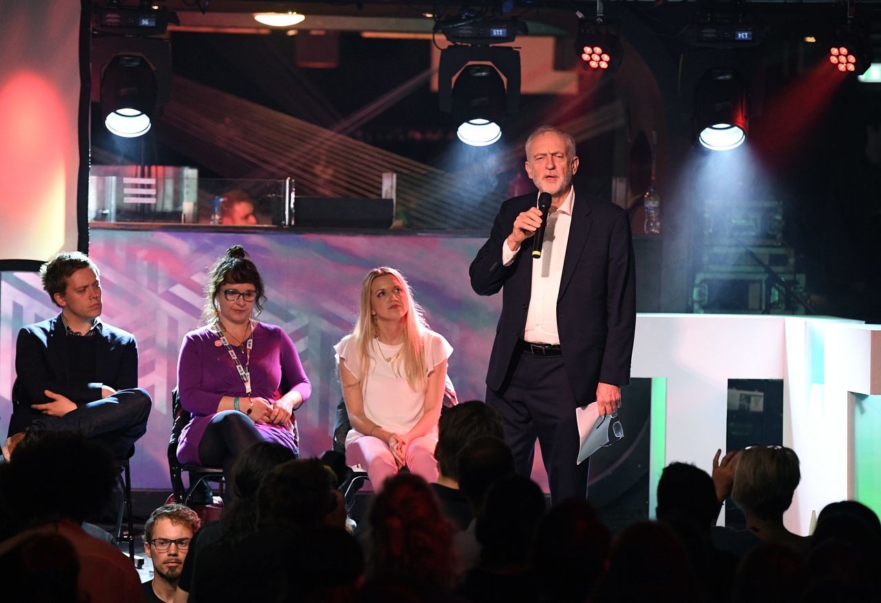 Jeremy Corbyn addresses supporters during a momentum rally on the first day of the Labour Party conference