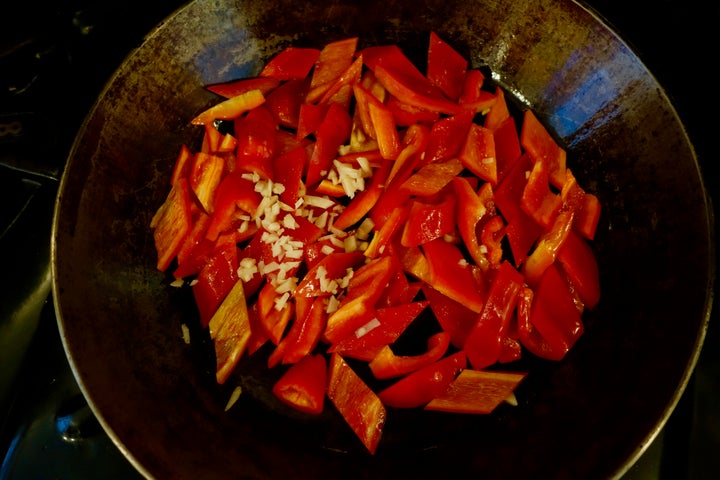 Briefly sauté the peppers with chopped ginger