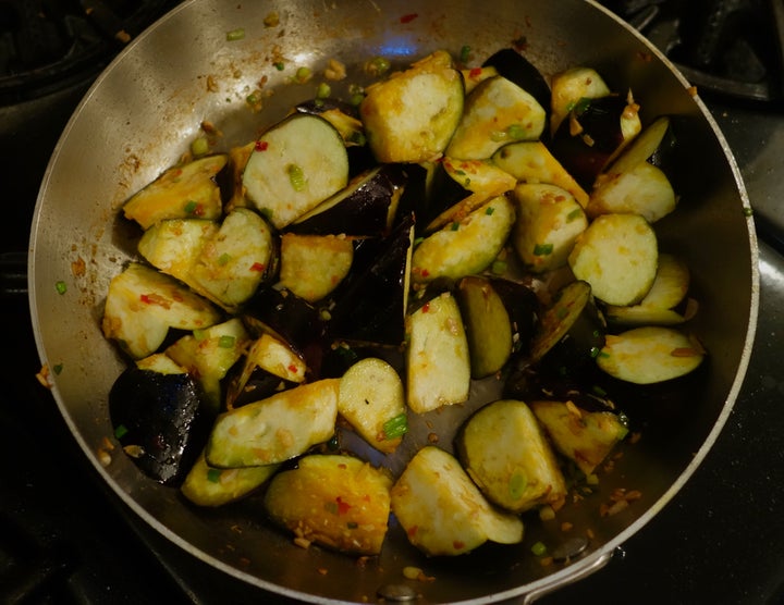 Cook the eggplant with the remaining aromatics (including Chinese chili sauce from a jar) until tender