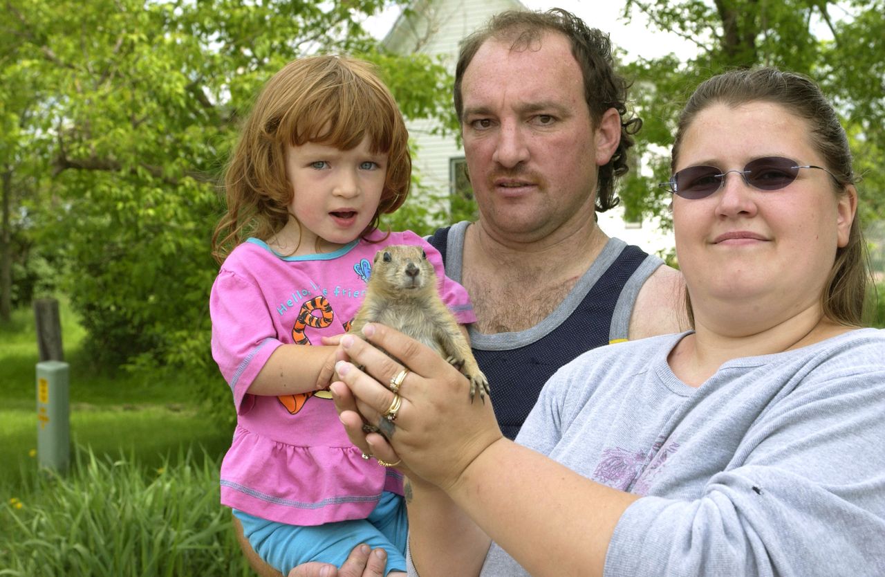 The Kautzer family of Wisconsin and their prairie dog Chuckles in 2003. The family contracted monkeypox from a second prairie dog that later died. Several other people across the Midwest also contracted the virus that year.