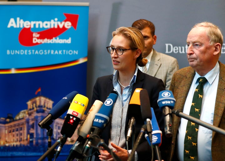 Anti-immigration AfD party top candidates Alice Weidel and Alexander Gauland make a statement after their first parliamentary meeting in Berlin on Tuesday. 