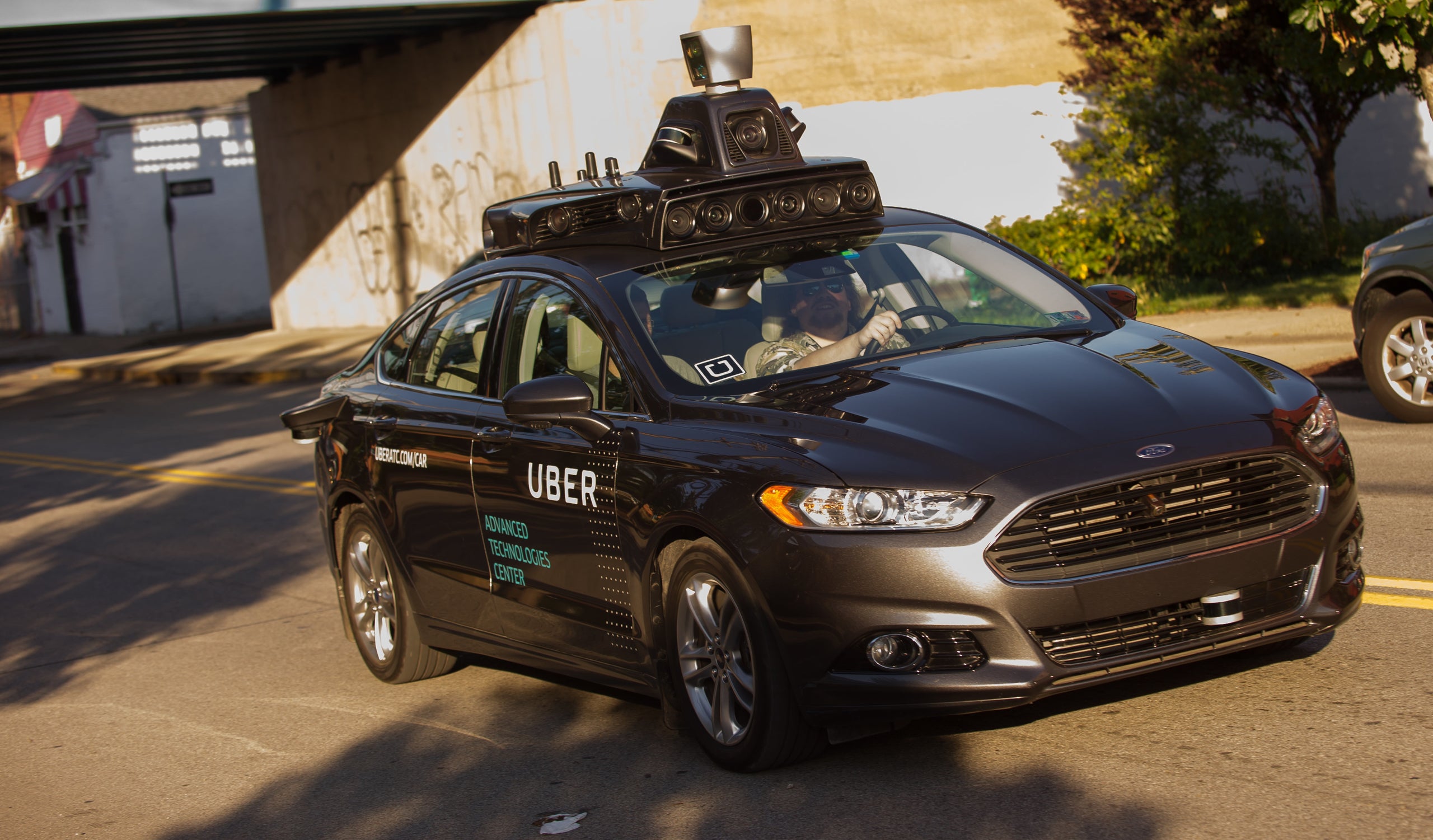 An Uber autonomous Ford Fusion drives through Pittsburgh in September 2016. The company, which now partners with Volvo, curre