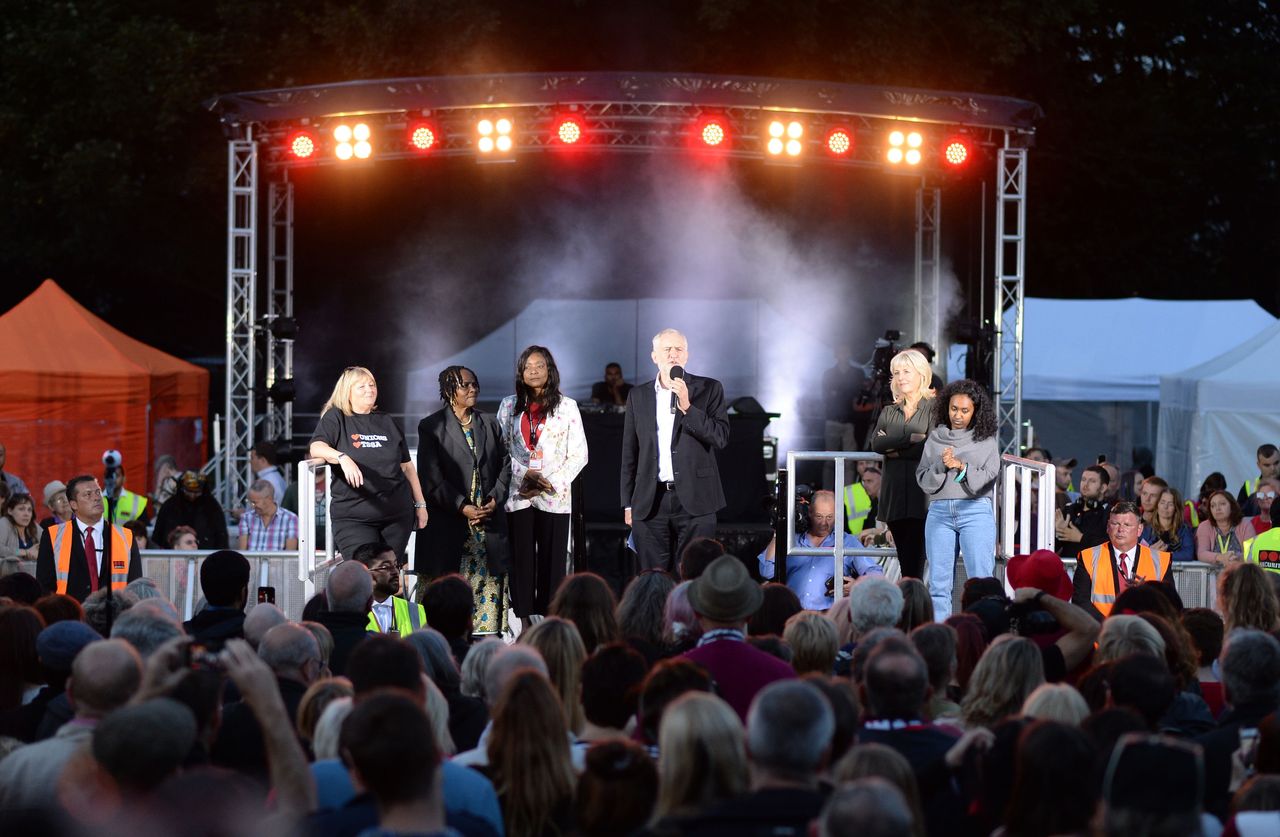 Corbyn speaks at a rally in Brighton ahead of his party's annual conference