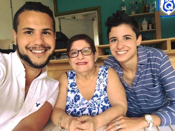 Samy Nemir Olivare (left) with his mother and sister. 
