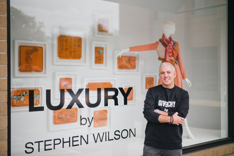<em>Stephen Wilson in front of his pop-up show at Capitol in Charlotte, NC.</em>