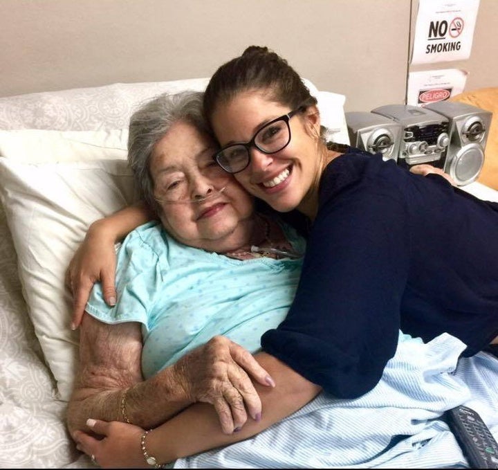 Mia Castro embraces her grandmother.