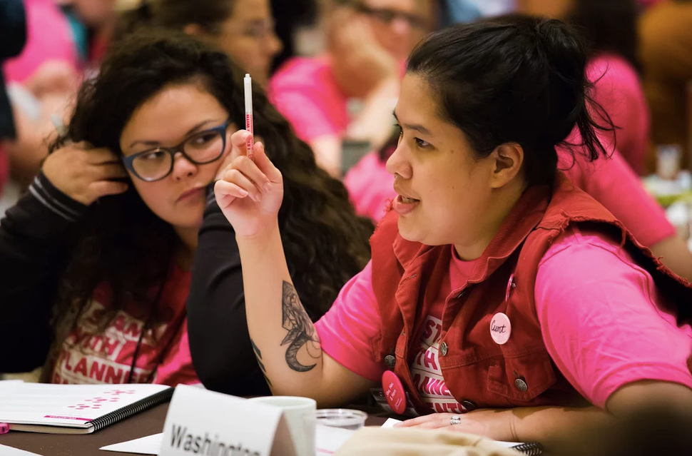 Planned Parenthood organizers and volunteers gather in Bellevue, Wash., Sept 23, 2017.