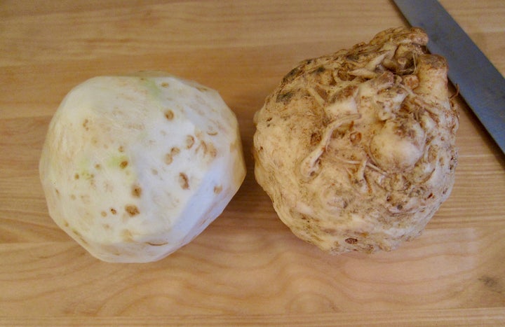 Two celery roots, one peeled