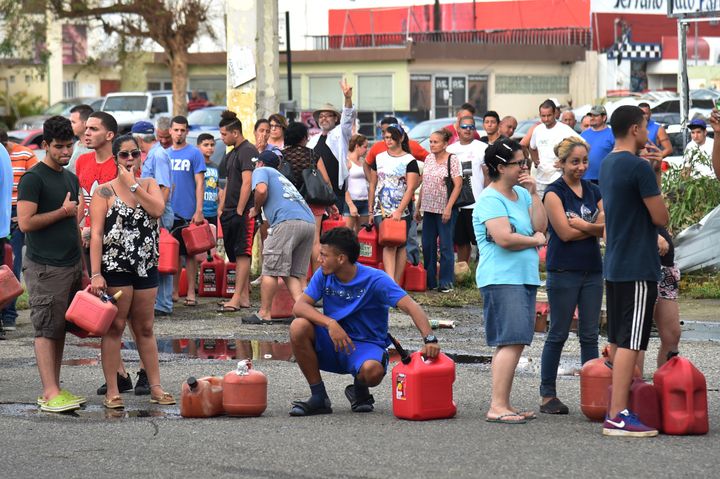 People wait in line to purchase gas in Arecibo, northwestern Puerto Rico, in the aftermath of Hurricane Maria on Sept. 22, 2017.