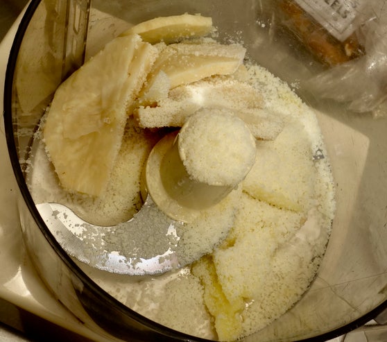 <p>Leftover cooked celery root with grated parmesan, ready to be pureed</p>