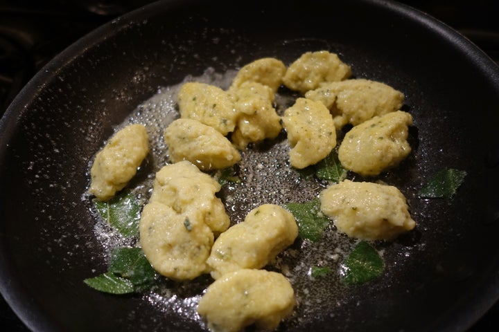 Being tossed in butter and sage after about two and a half minutes of simmering