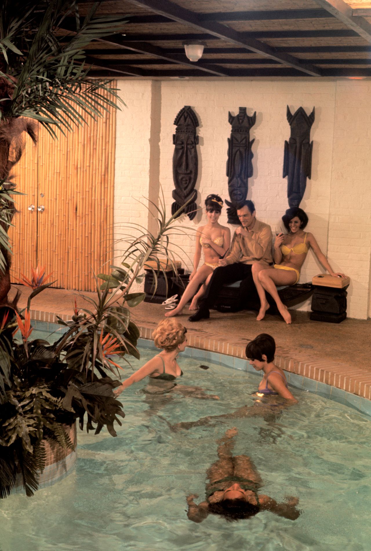 Burt Glinn, "Playboy founder, Hugh Hefner, at his mansion." Chicago, IL., USA, 1966