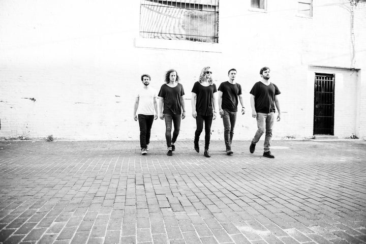 <p>Sunbathers left to right: Peter Leonard, Tim Boaté, Sean Lynott, Shohsei Oda, and Pete Mindnich</p>