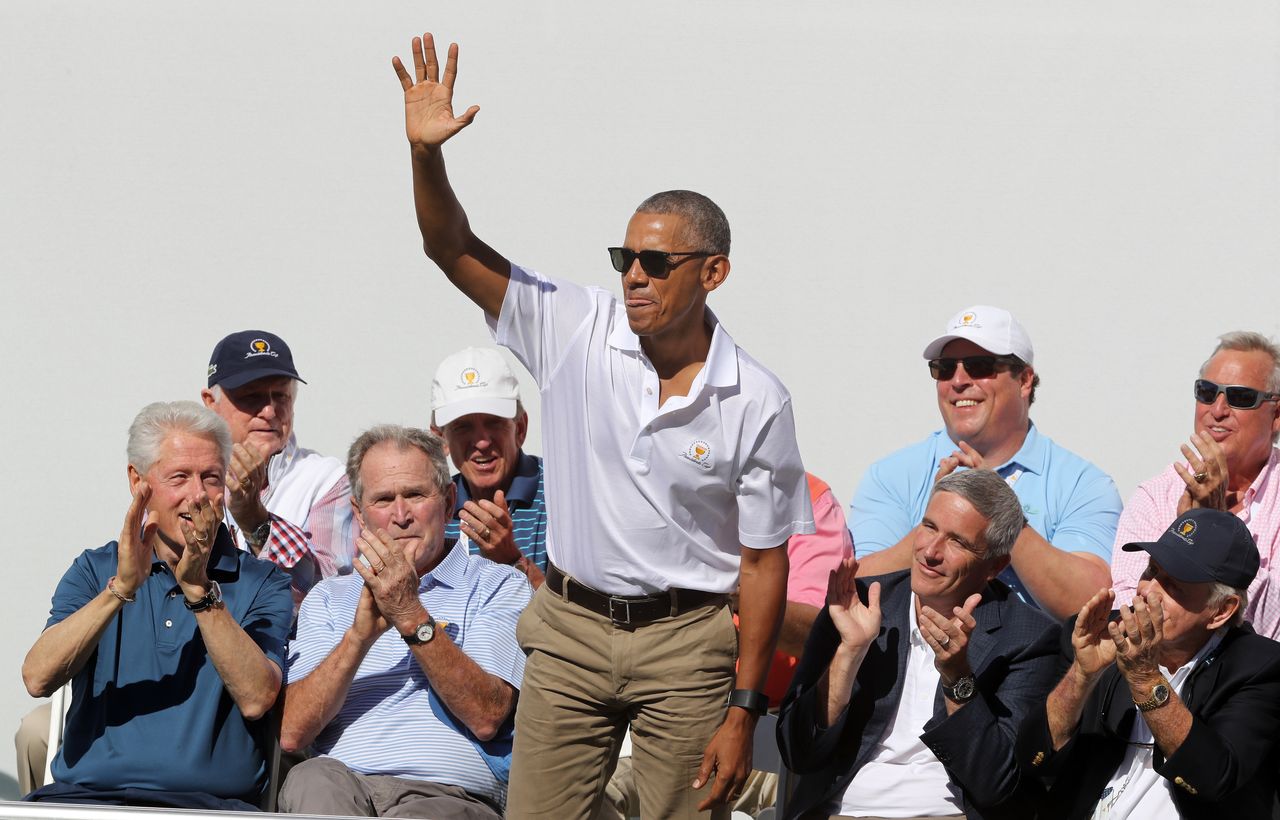 Obama waves to the crowd.