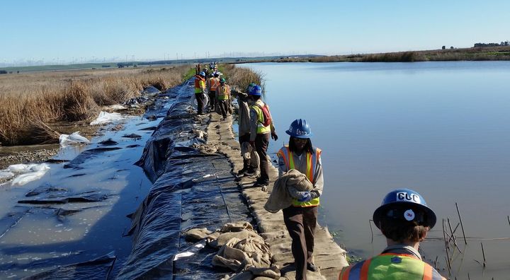 California Conservation Corps members (Stockton) shoring up the levee on Grizzly Island in Solano County — http://bit.ly/2hzPLVG