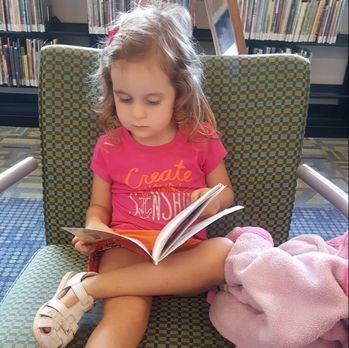 <strong> Emma at the library</strong>