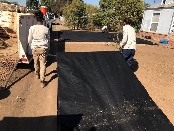 AmeriCorps members with Fresno EOC Local Conservation Corps help make a property more drought-resistant — http://bit.ly/2k8ySlS