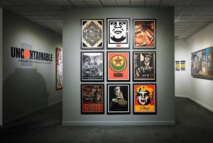 National Institute of Urban Art's inaugural exhibit, Uncontainable, featuring (left to right) works from Shepard Fairey's "OBEY GIANT" series and Brian Douglas 