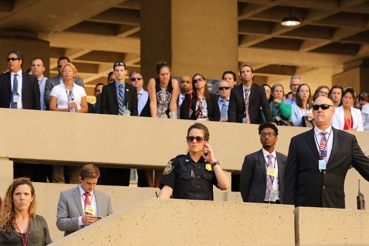 FBI employees and guests look on during the ceremony.