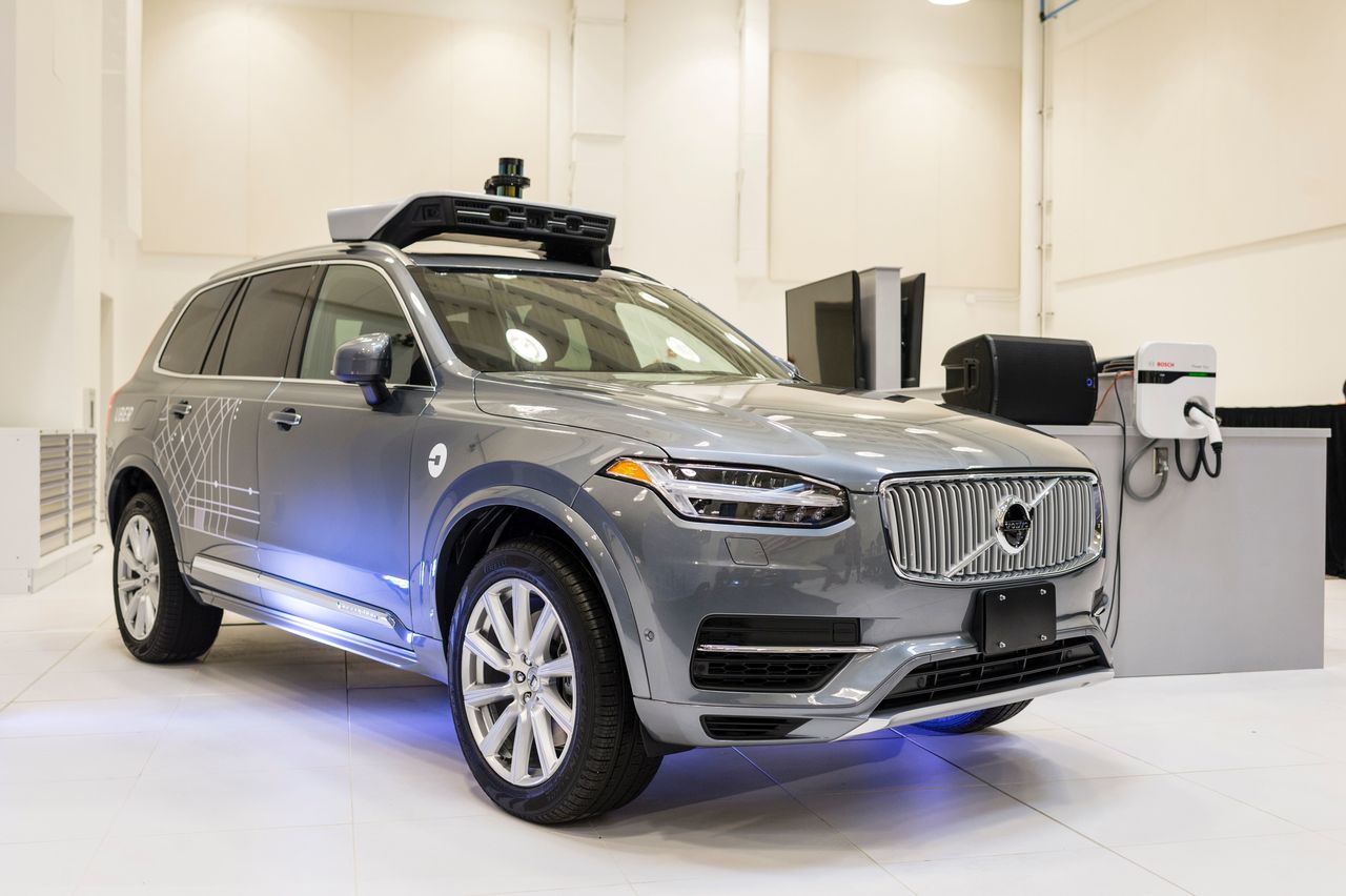 Uber's self-driving vehicles are topped with rotating sensors. This pilot model is displayed at the Uber Advanced Technologies Center in Pittsburgh in September 2016.