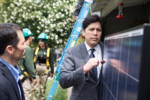 CA State Senate leader Kevin de León, right, at a solar installation project. Photo by Carl Costas for CALmatters
