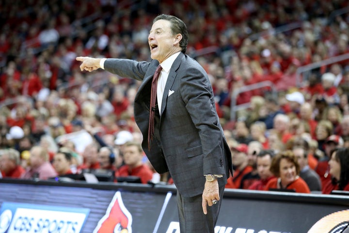 Louisville basketball coach Rick Pitino was "effectively fired" on Wednesday, his lawyer said, a day after his program was engulfed in the latest college sports corruption scandal.