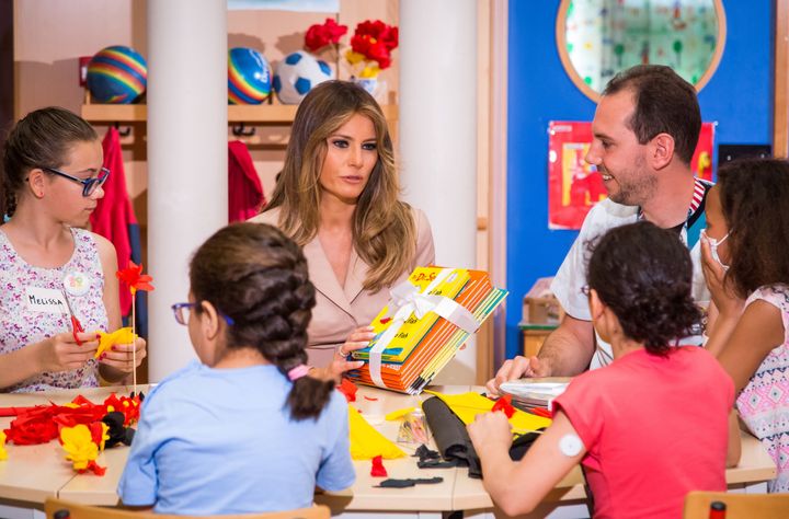 Melania Trump gives Dr. Seuss books to patients as she visits the Queen Fabiola Children's Hospital in Brussels in May.