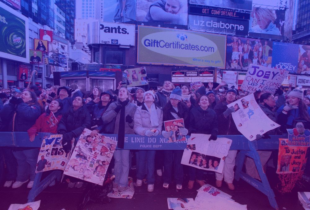 "TRL" fans gathering in Times Square, waiting for a glimpse of *NSYNC, in 2001.