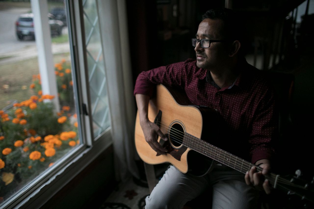 Amber Subba plays music at home in Cuyahoga Falls, Ohio.