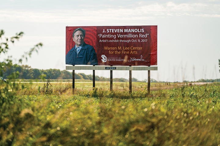 <p>Billboard commemorating J. Steven Manolis’ “Painting Vermillion Red” exhibition. Highway 50, South Dakota.</p>