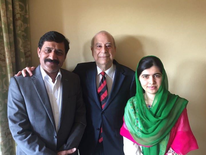 Ambassador Ahmed (center) meets with Malala Yousafzai and her father, Ziauddin Yousafzai, during their recent visit to Washin