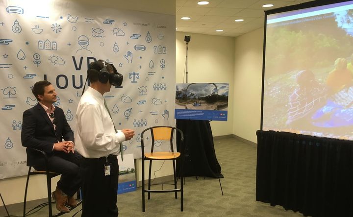 USAID Administrator Mark Green watching a 360/VR film featuring SeaPower, aquaculture innovators in Tanzania. 